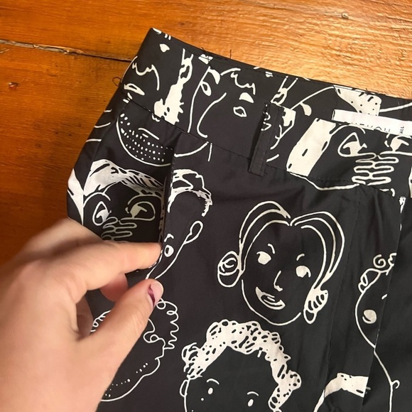 Urban Outfitters Shekou X-Small black pants with white faces EUC silky material - Picture 6 of 10